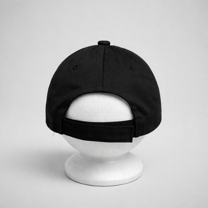 Baseball Cap Prvo Bijelo Polje Black cap on a white mannequin head against a light gray background on shopncro.com