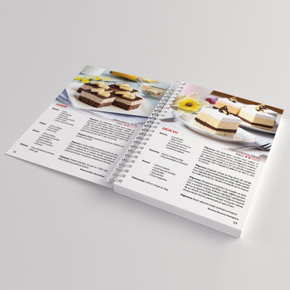 Moji Kremasti KOLAČI Open cookbook showing dessert recipes on a light gray background