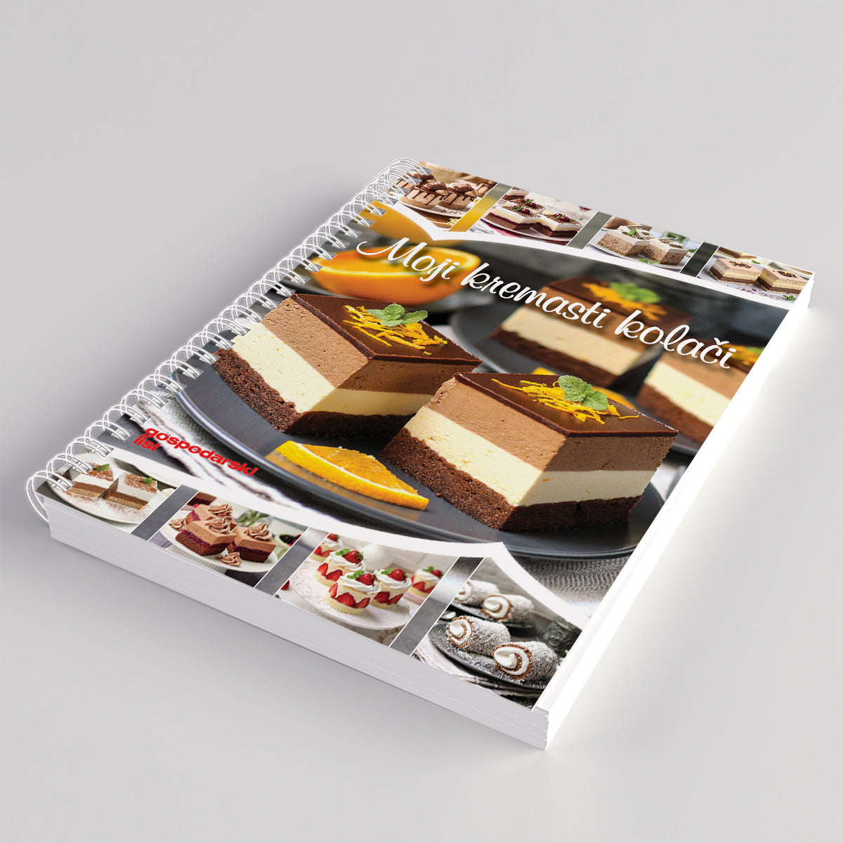 Moji Kremasti KOLAČI Spiral-bound notebook with dessert images and text on a gray background